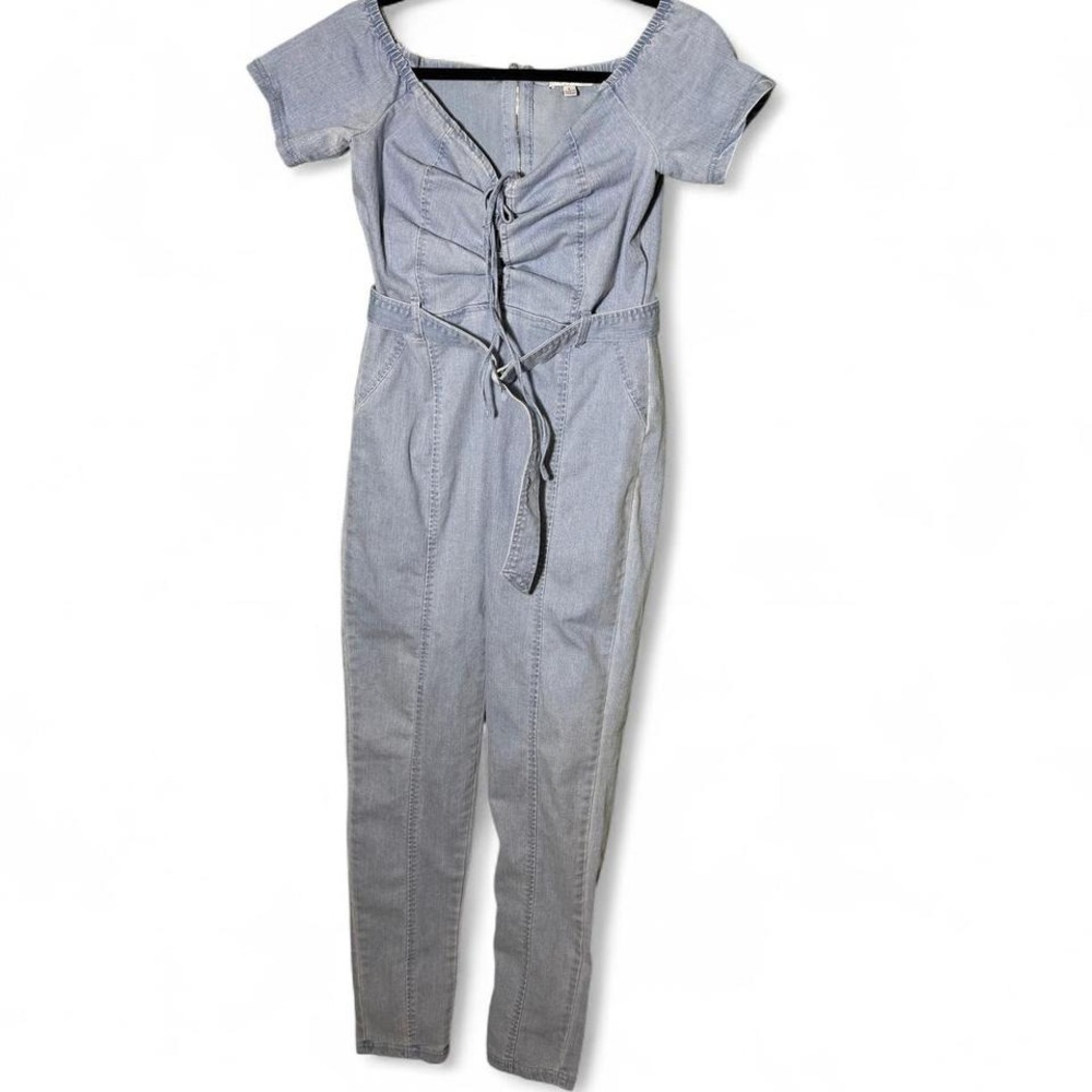 Fashion Nova size L light blue denim jumpsuit‎ with belt and tie-up front